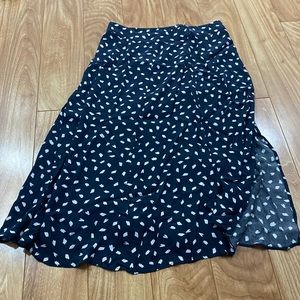 Calf length skirt with slit